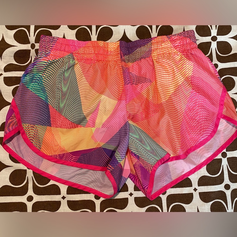 Pink multi colored danskin now running shorts. Size large 12/14. EUC